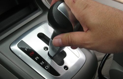 Shift to neutral while your automatic car is at a standstill or not?