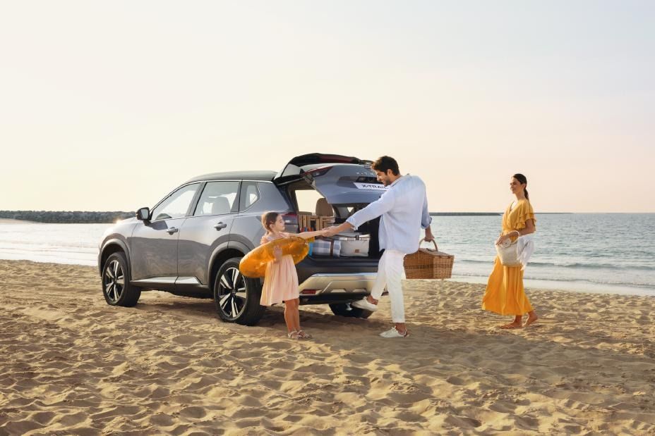 Nissan X-trail Boot on beach with Passengers
