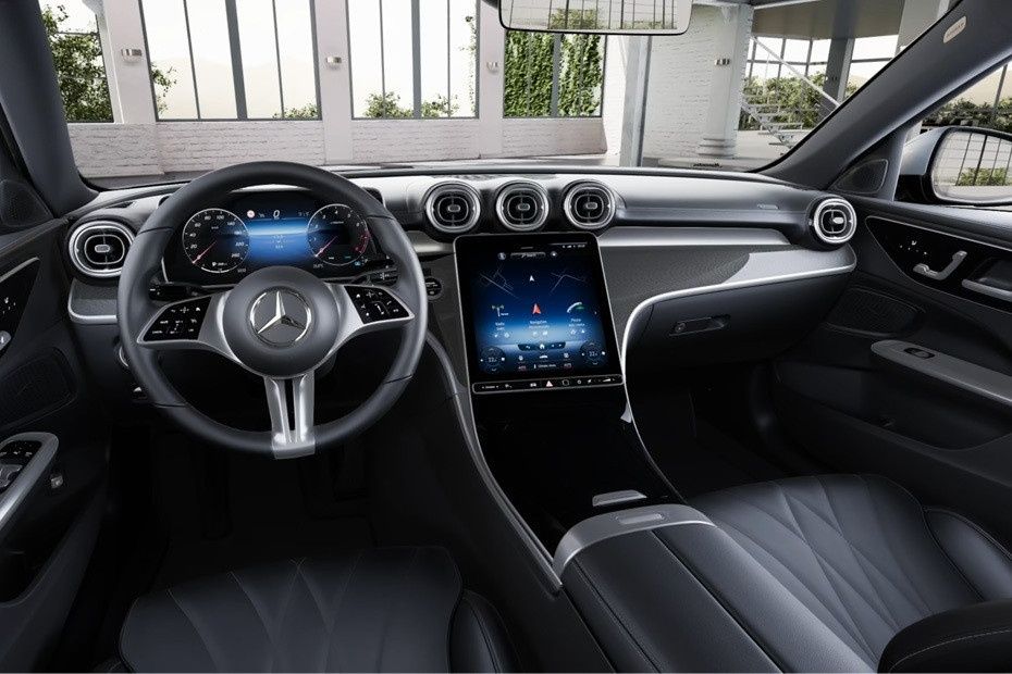Mercedes-Benz C-Class interior with steering wheel, digital cluster