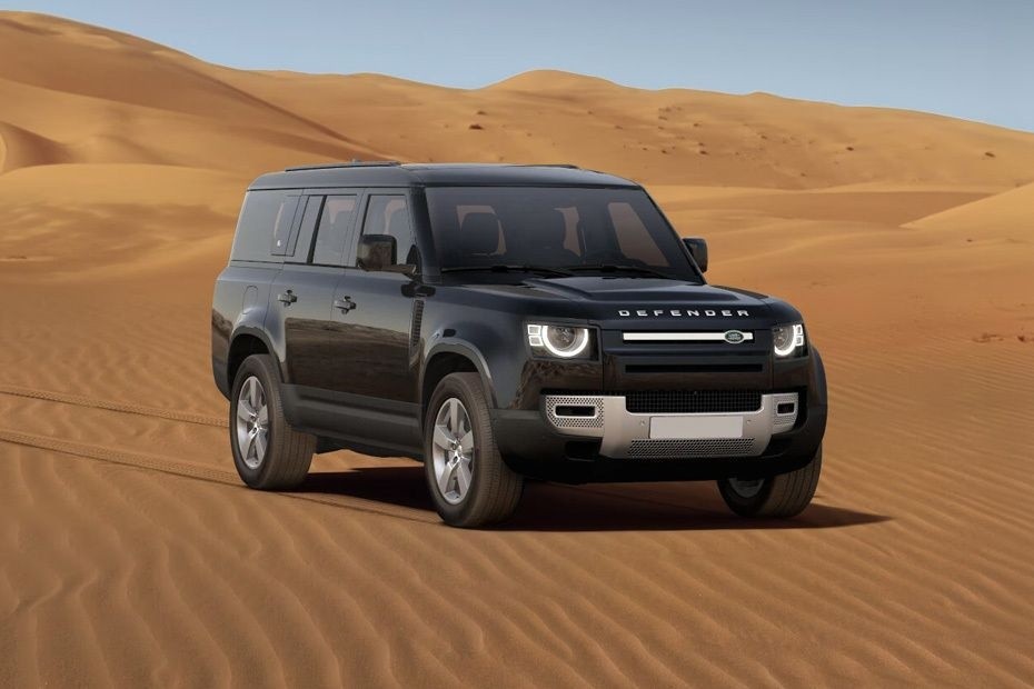 Land Rover Defender showcasing strong engine performance on desert terrain