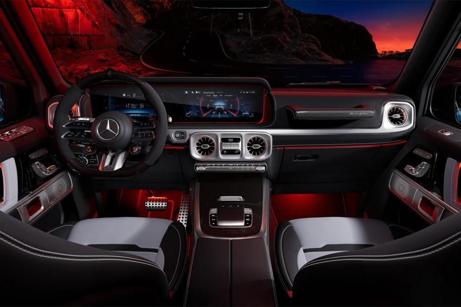 Mercedes-Benz G-Class interior featuring premium dashboard, digital display, and ambient lighting