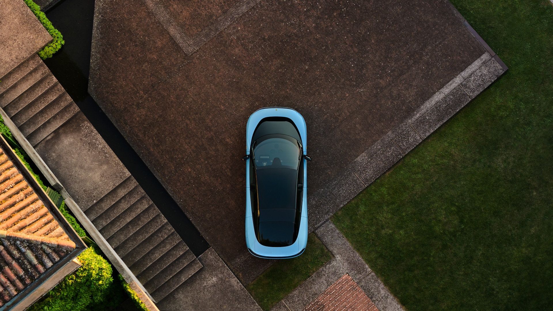 Ferrari Luce top view showcasing futuristic design and innovative four-door layout