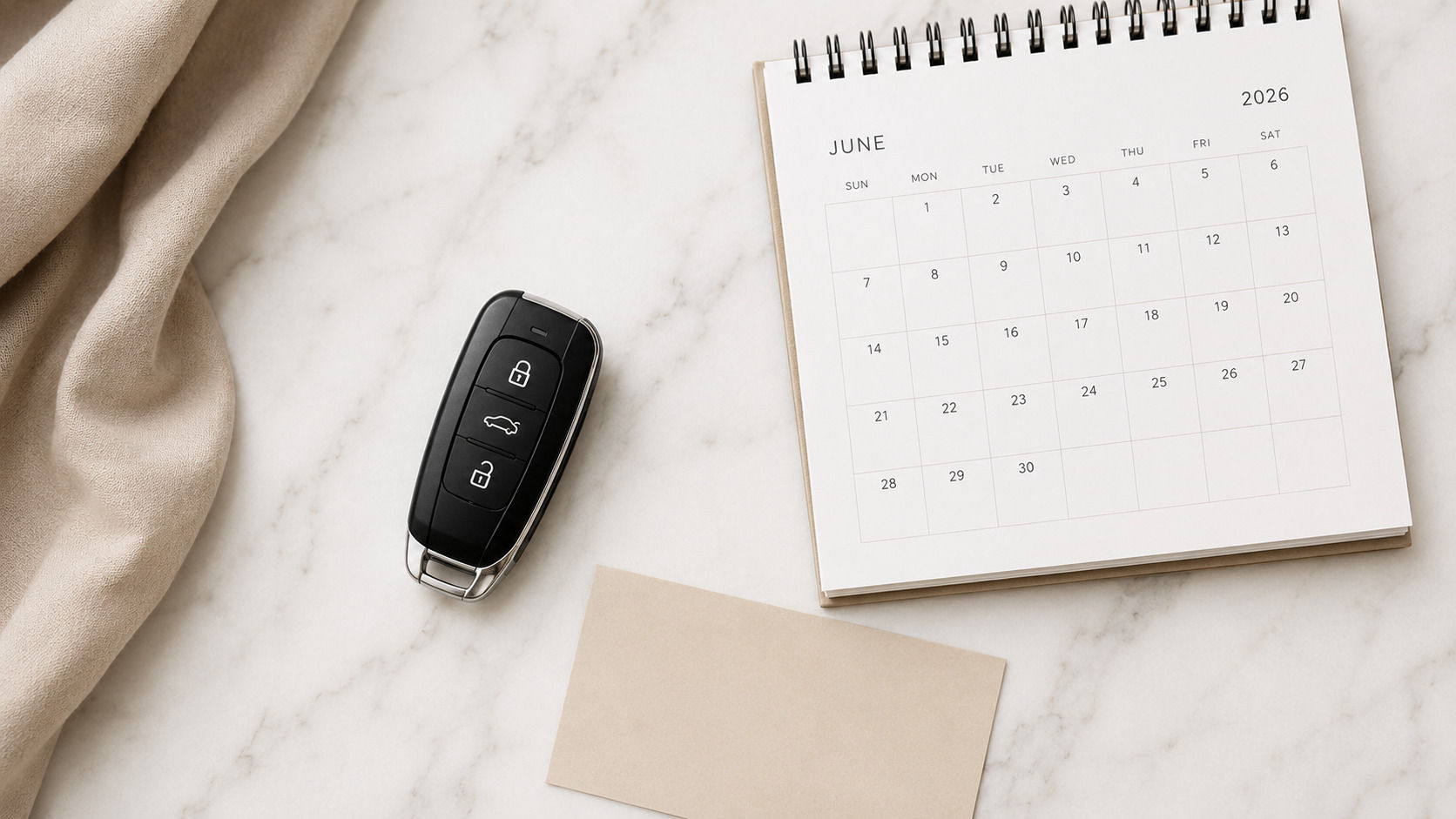 Car key and June 2026 calendar representing MG Motor's limited-time finance offer in the UAE