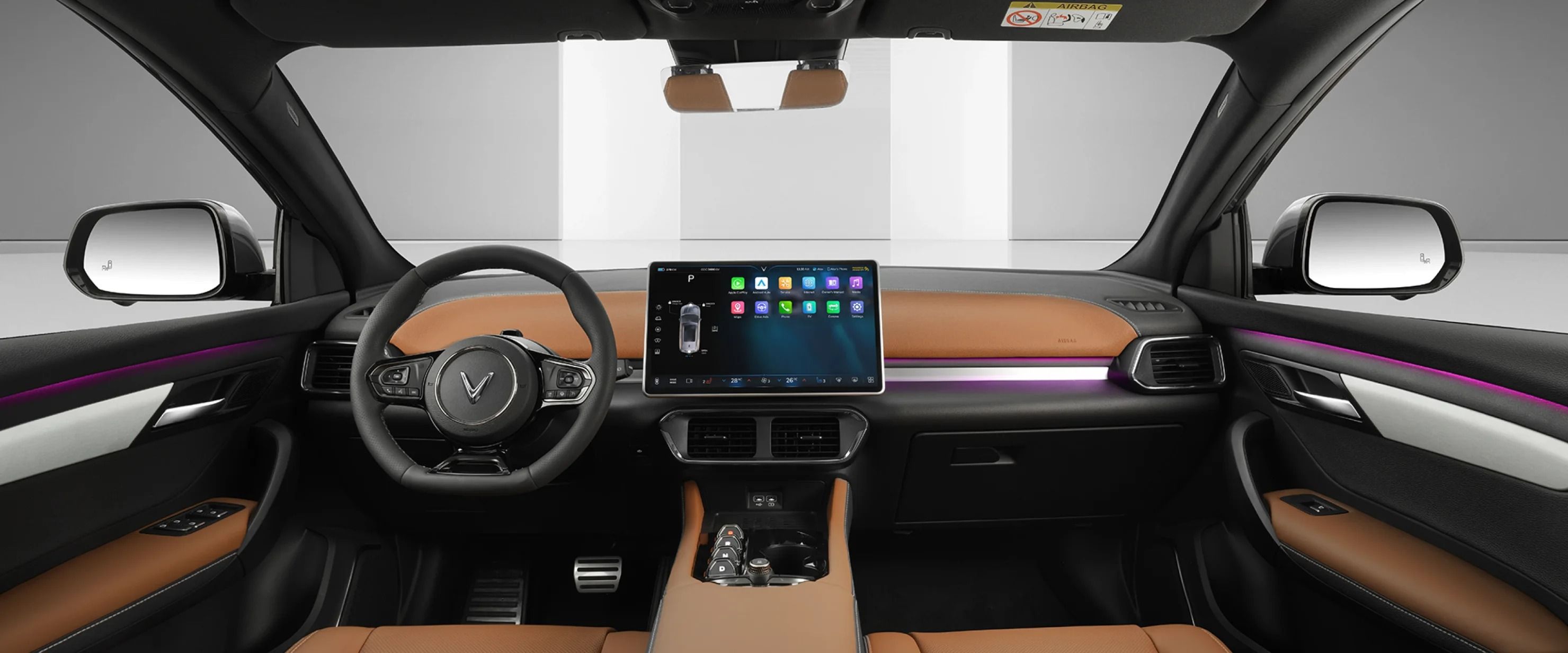 Front cabin of the VinFast VF 8 showcasing digital display and ambient lighting