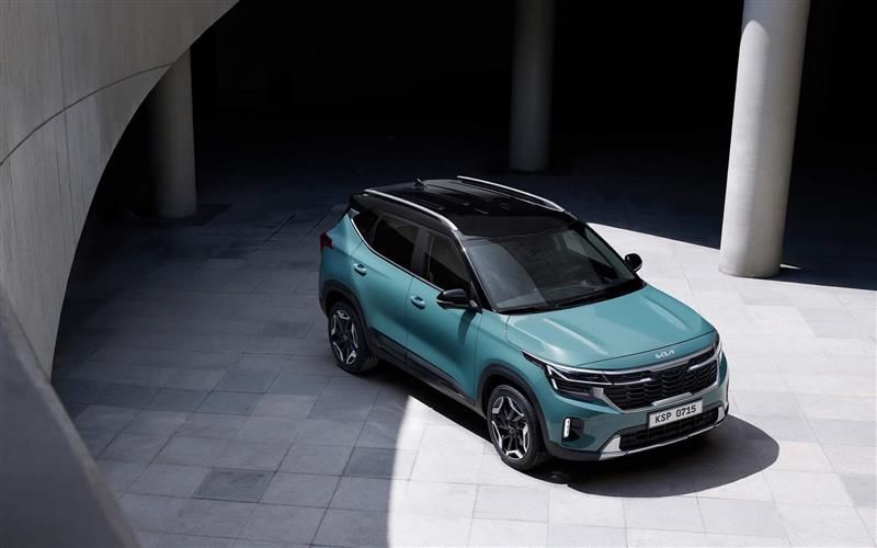 Kia Seltos exterior with panoramic sunroof and modern SUV styling.