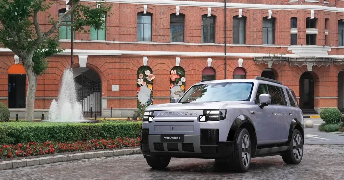 2026 Freelander 8 premium electric SUV parked outside a historic building during its global unveiling in Shanghai.