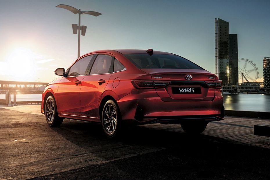 Red 2026 Toyota Yaris sedan with stylish rear design and LED taillights