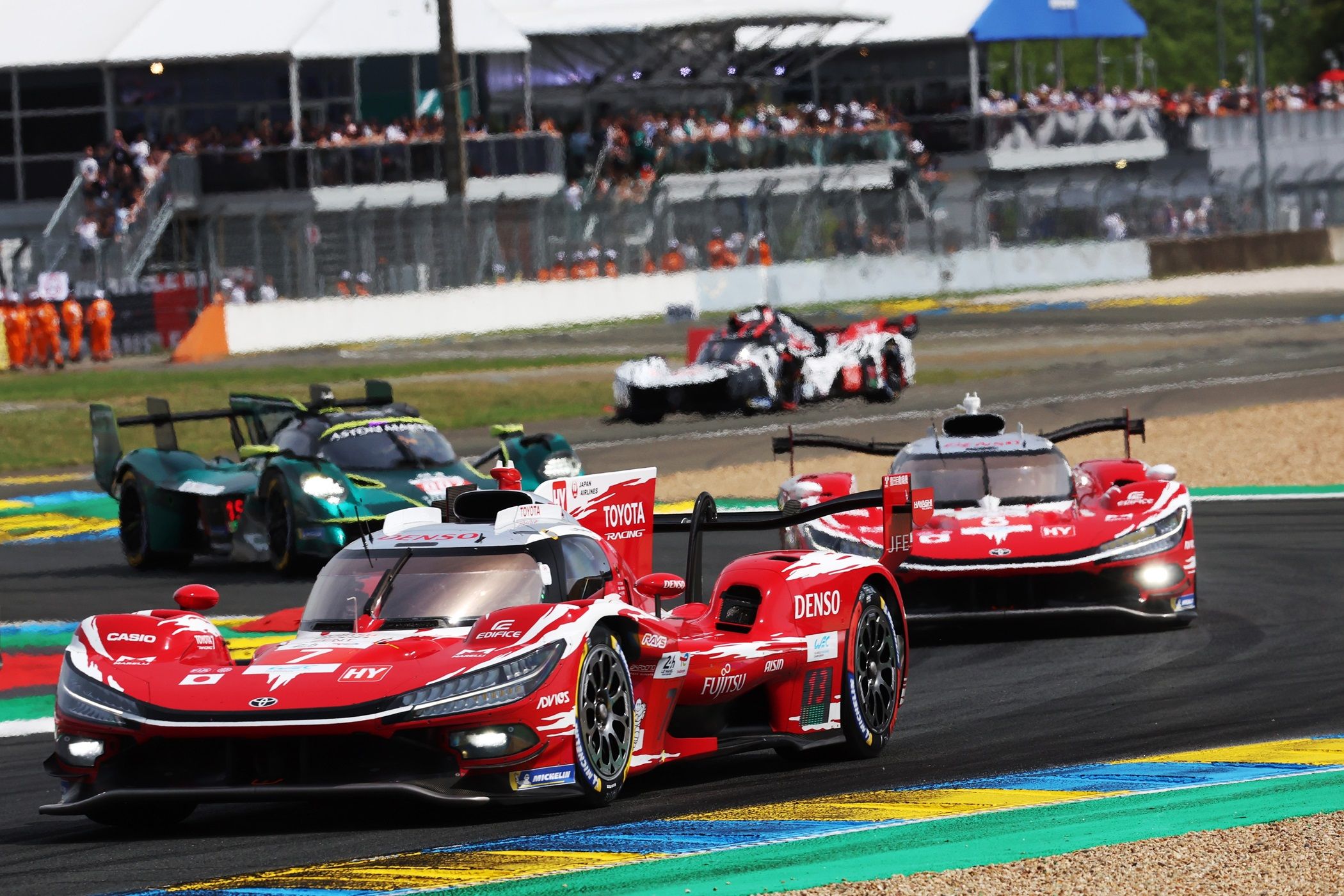 TOYOTA RACING's No. 7 Toyota TR010 Hybrid leads the field during the 2026 24 Hours of Le Mans endurance race.