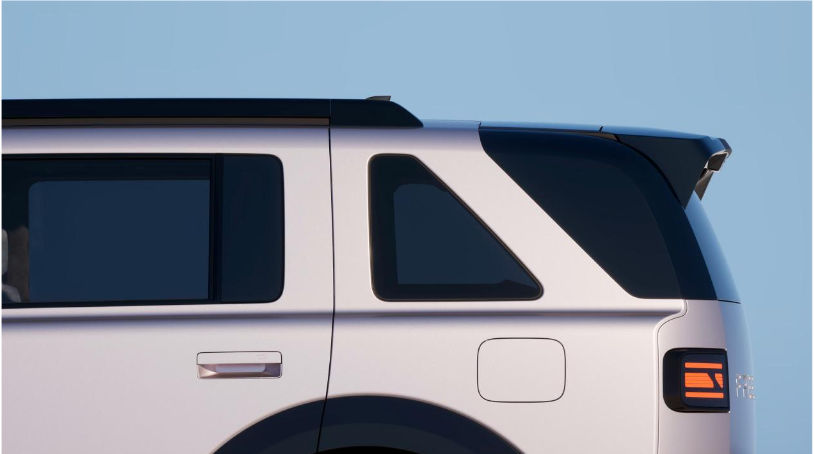Freelander 8 rear quarter design with signature taillights and floating roof styling.