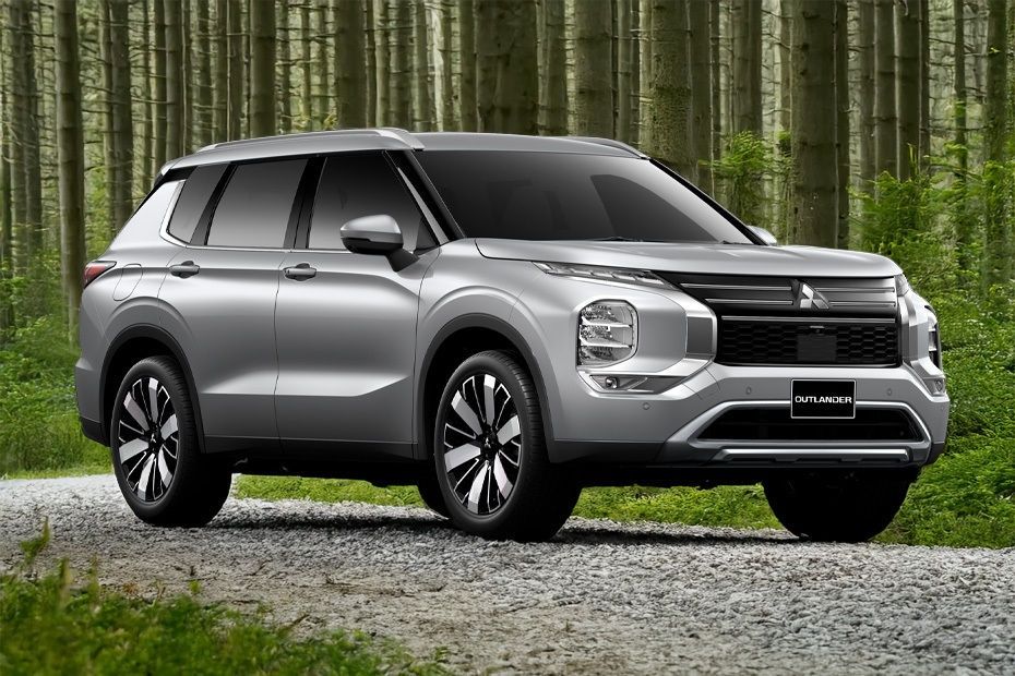 Mitsubishi Outlander parked on a forest road