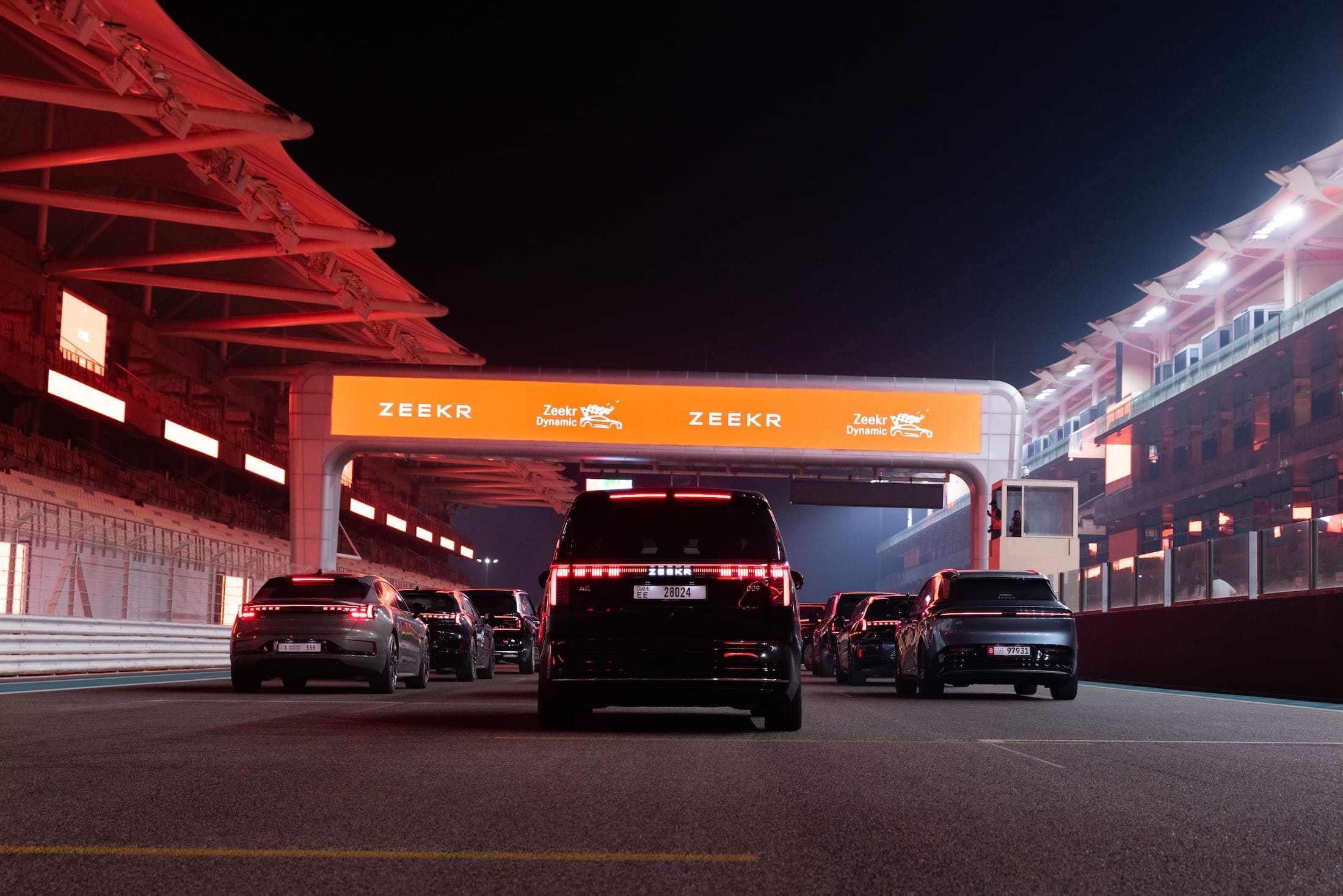 Zeekr vehicles line up on the Yas Marina Circuit pit straight during the brand&rsquo;s UAE track day event in Abu Dhabi.