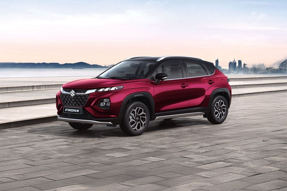 Red Suzuki Fronx front three-quarter view