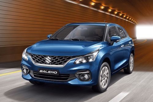 Suzuki Baleno blue hatchback on the road