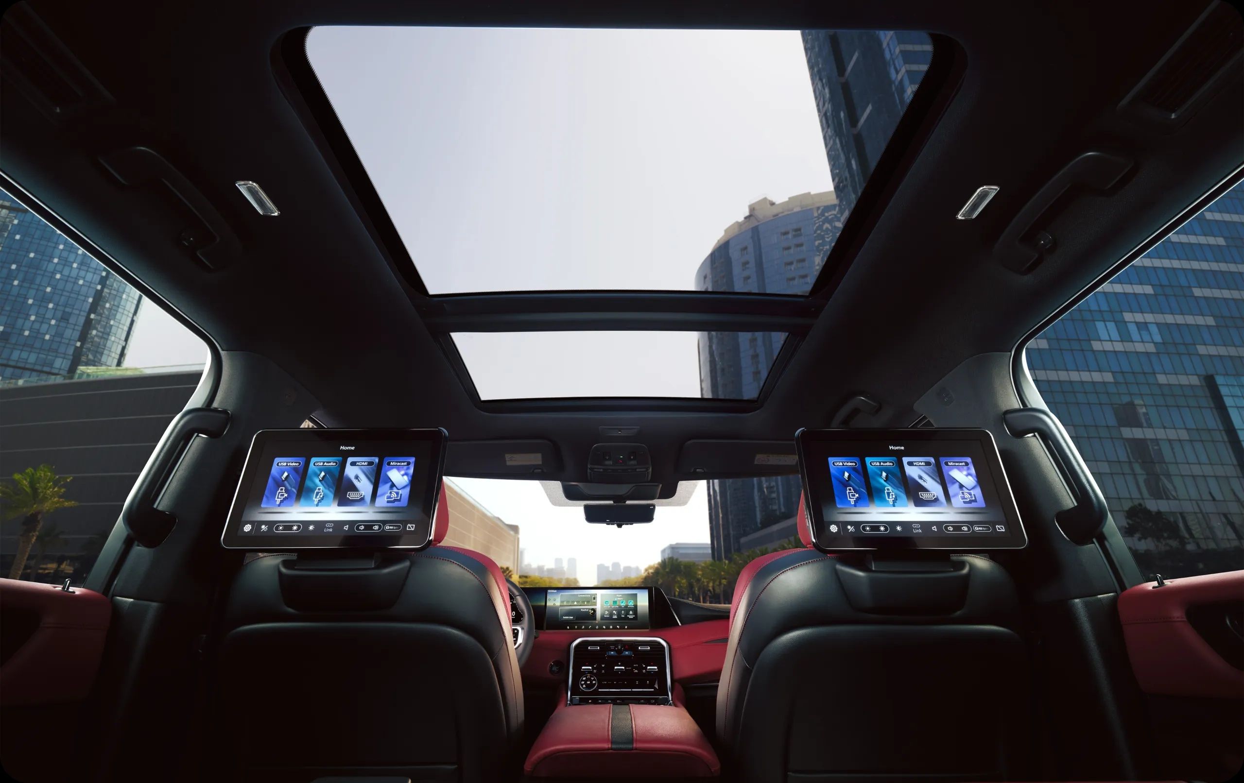 Nissan Patrol panoramic sunroof with dual rear entertainment screens and premium cabin interior