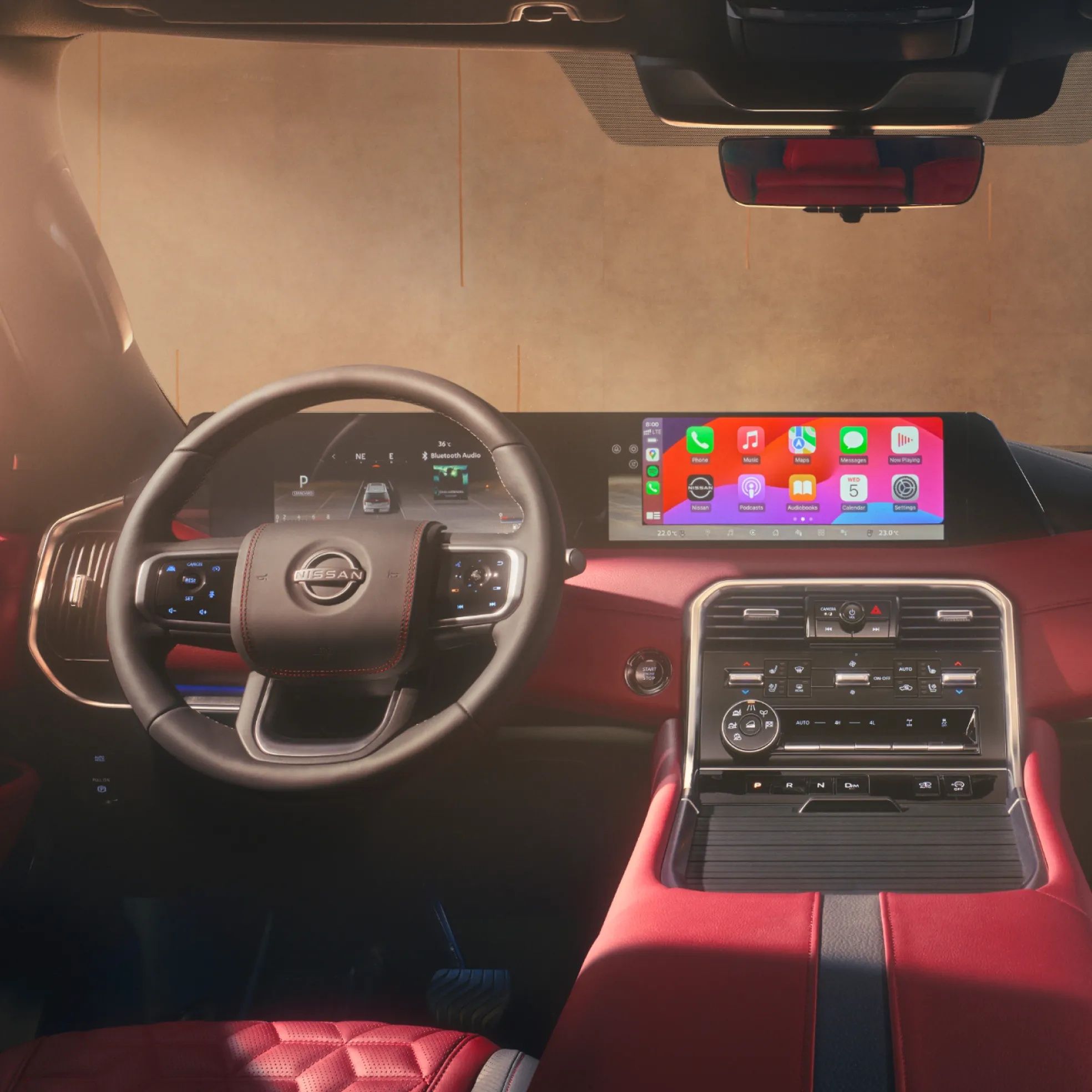 Nissan Patrol premium dashboard with dual displays, Apple CarPlay, and luxury cabin