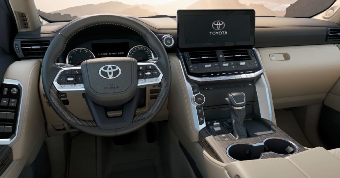 Toyota Land Cruiser dashboard featuring touchscreen infotainment and premium interior design