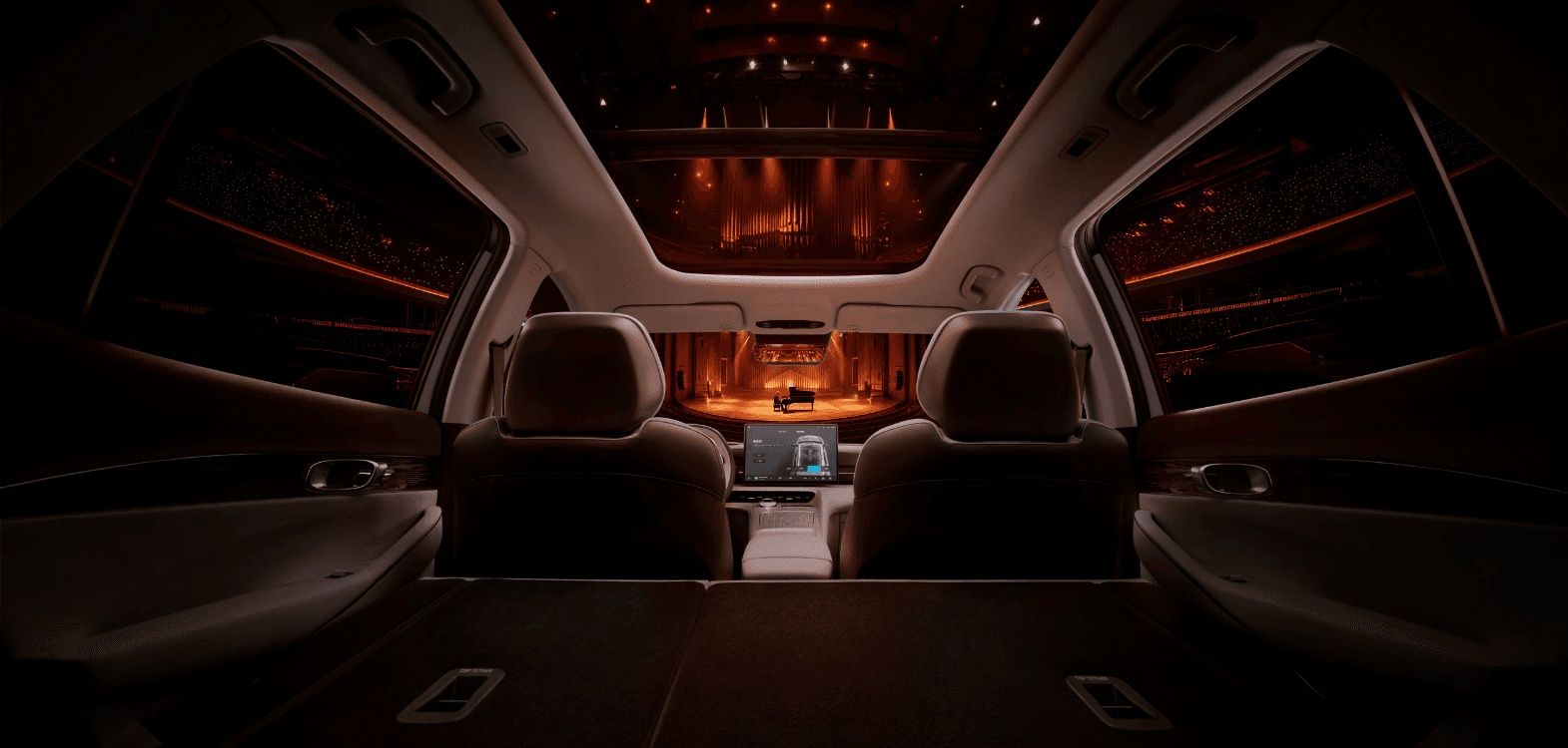 Geely EX5 interior featuring a panoramic sunroof, spacious cabin, and modern dashboard