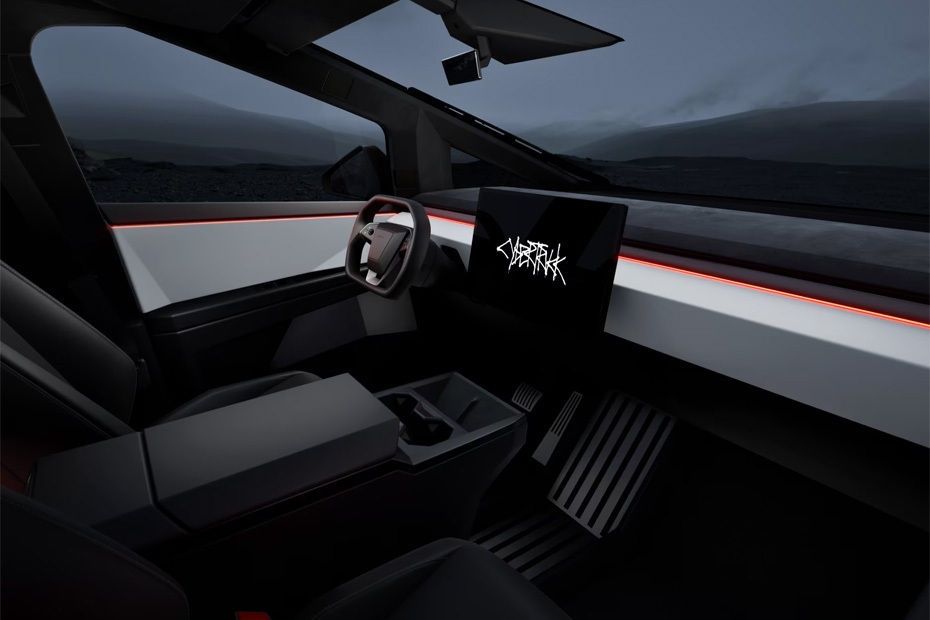 Tesla Cybertruck dashboard with 18.5-inch touchscreen and futuristic cabin design
