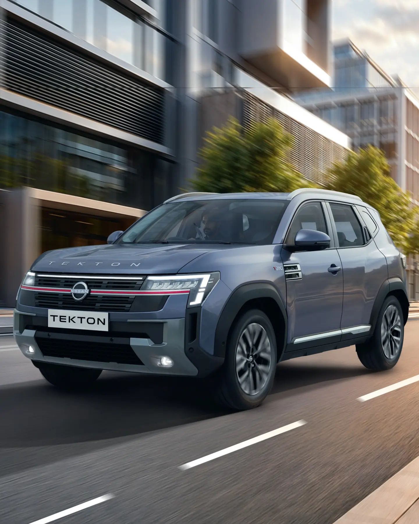 2026 Nissan Tekton driving on a city road showcasing bold SUV styling and LED lighting