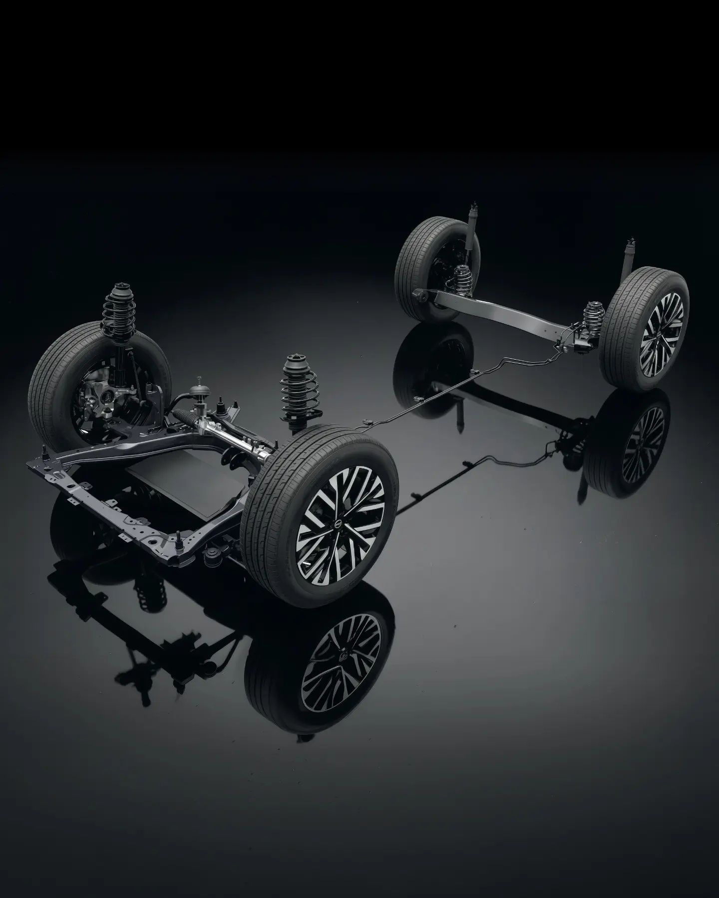 2026 Nissan Tekton suspension and chassis setup showcasing front MacPherson strut and rear twist beam suspension