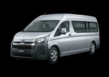 Toyota HiAce passenger van front three-quarter view in silver