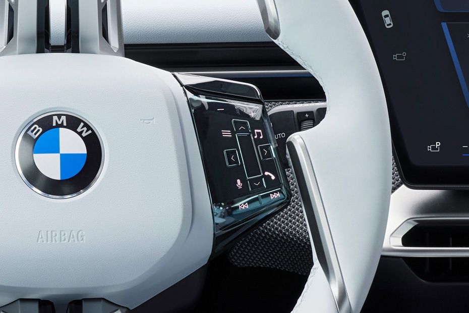 BMW iX3 multifunction steering wheel with touch controls and BMW iDrive