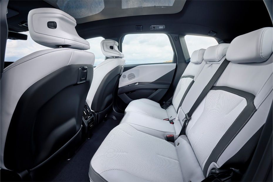 BMW iX3 rear seats with spacious cabin and premium white upholstery