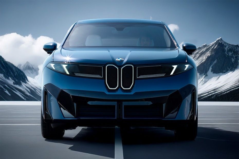 BMW iX3 front view highlighting illuminated kidney grille and LED headlights