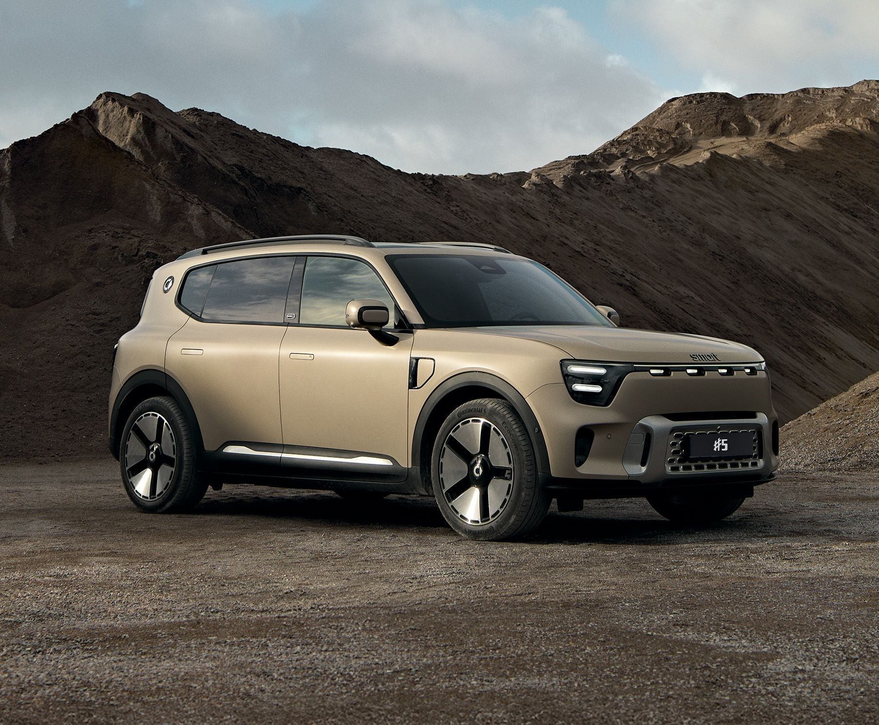 Smart #5 premium electric SUV parked against a rugged mountain landscape
