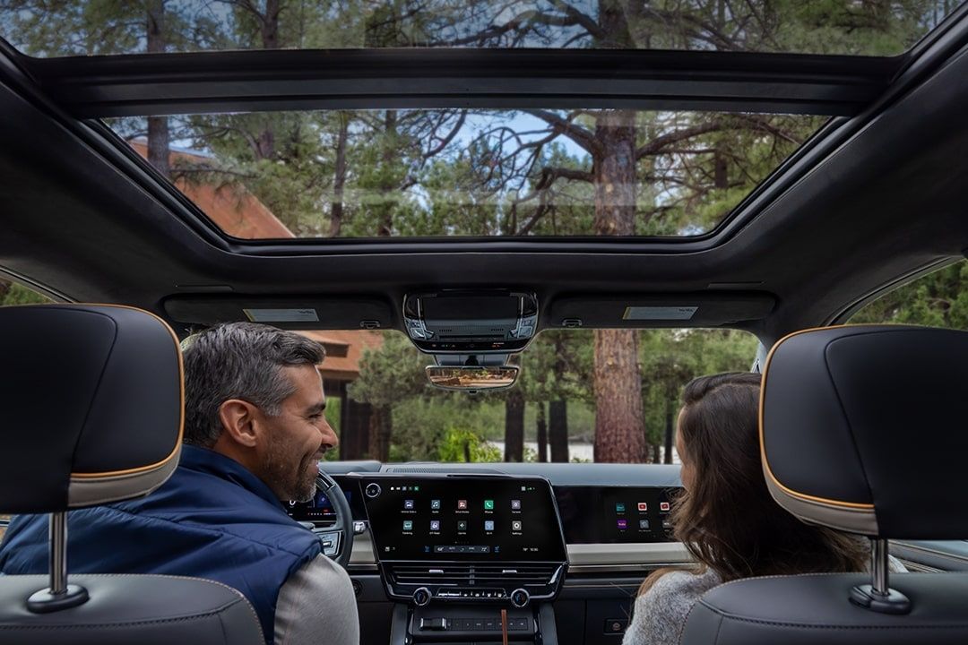 2027 Chevrolet Silverado 1500 cabin with panoramic sunroof and dual displays