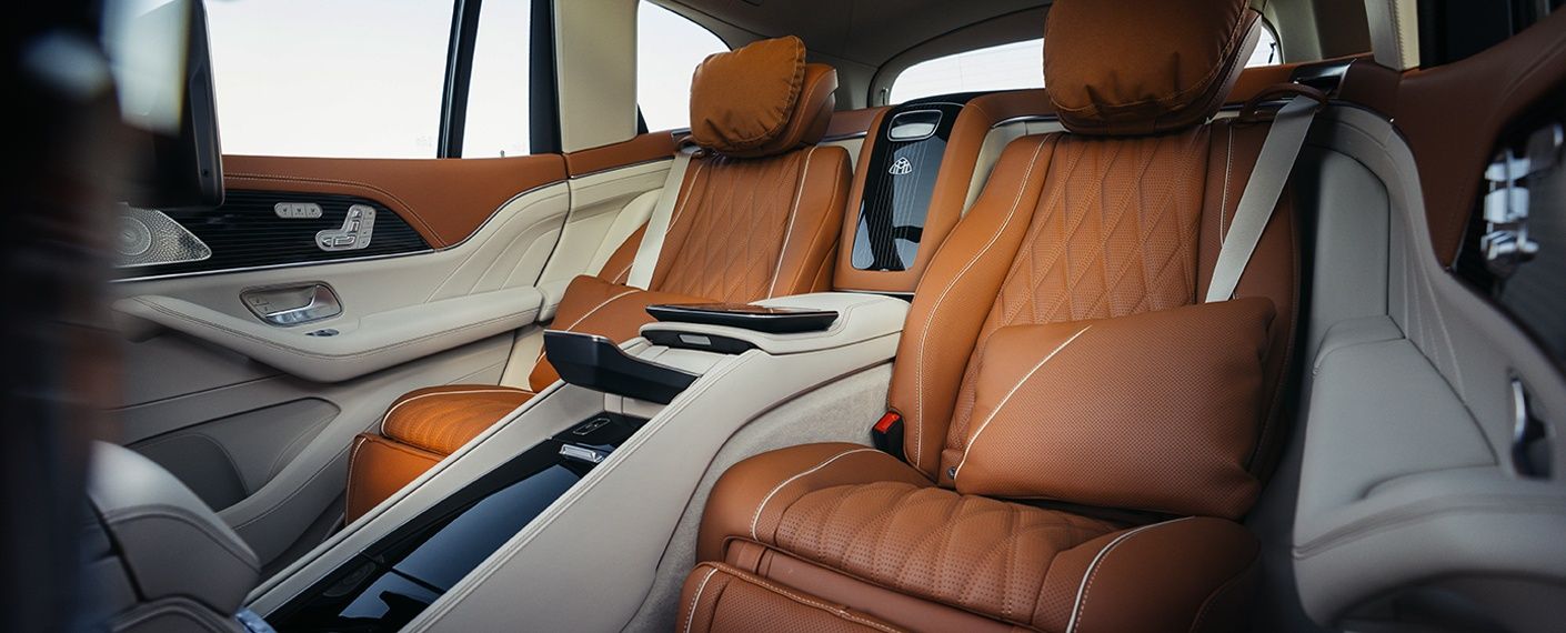 Mercedes-Maybach GLS 680 executive rear cabin with premium brown leather seats.