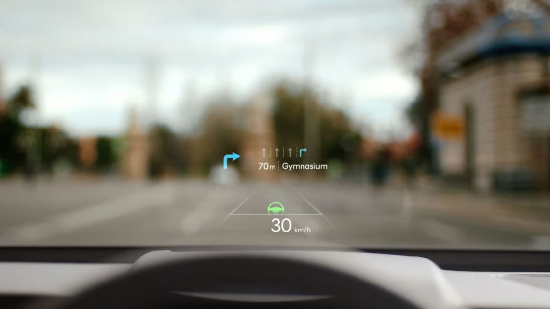 Hyundai Kona Electric head-up display projecting navigation and speed information for safer driving.