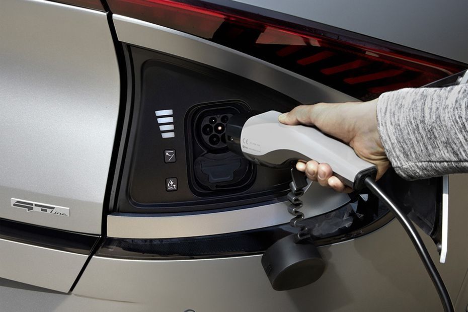 Kia EV6 charging port connected to an EV charger