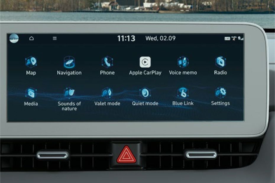 Hyundai IONIQ 5 infotainment touchscreen with Apple CarPlay and navigation