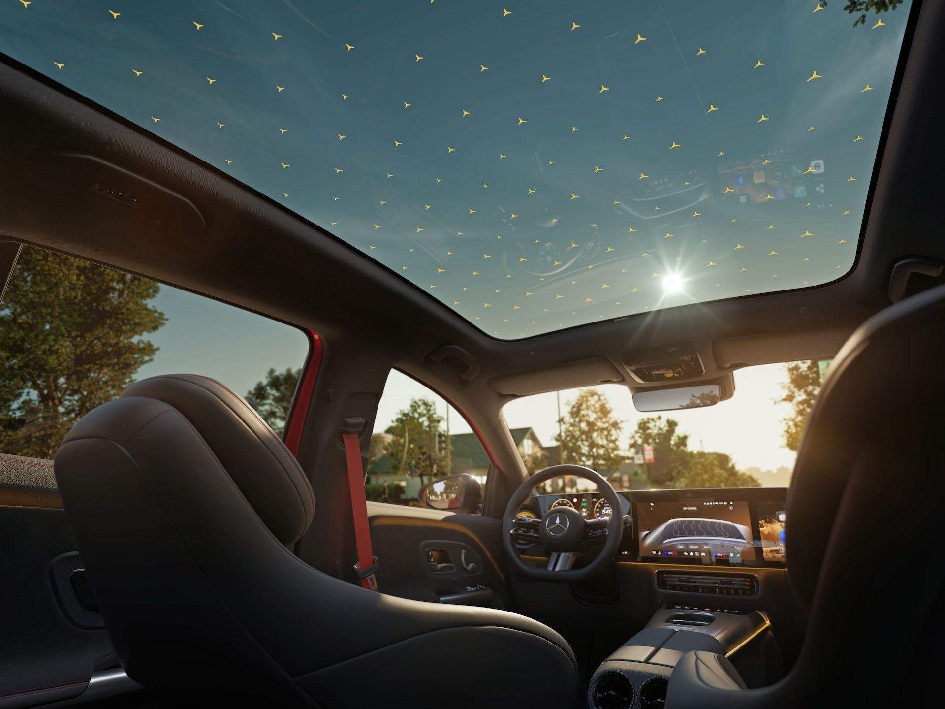 Mercedes-Benz GLA interior featuring the panoramic SKY CONTROL glass roof with illuminated star pattern