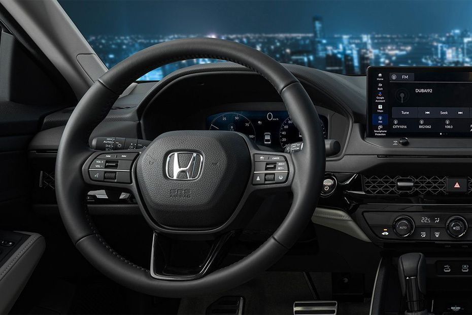 Honda Accord driver cockpit with multifunction steering wheel and digital instrument cluster