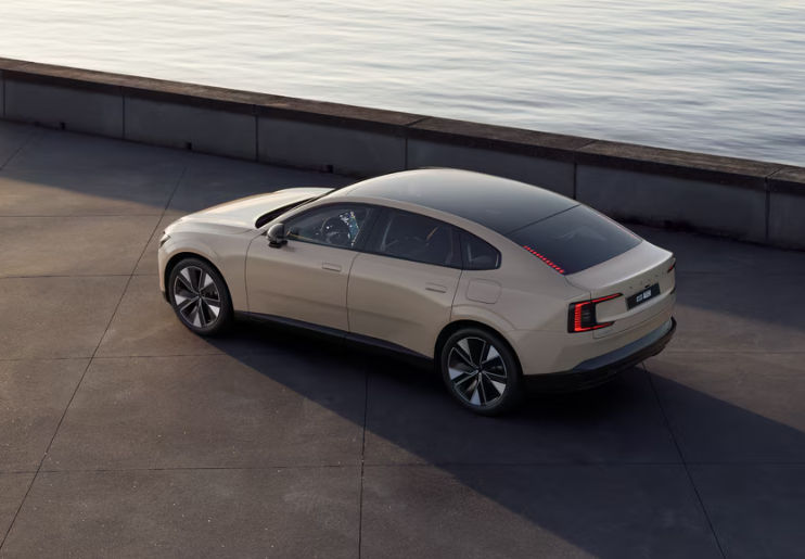 Volvo ES90 rear three-quarter view highlighting sleek fastback design