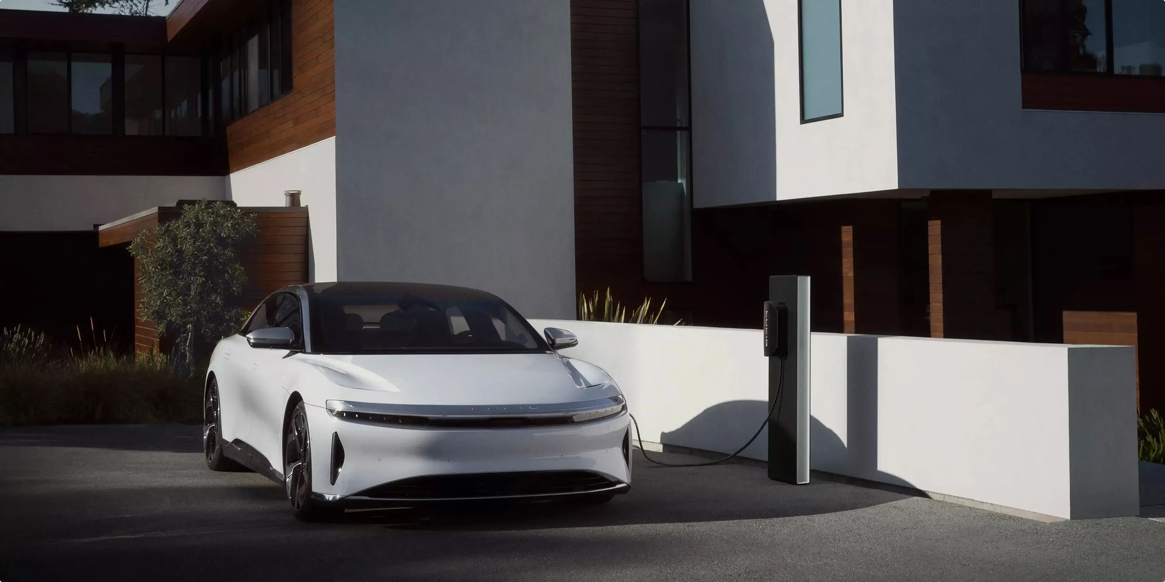 Lucid Air charging at a home EV charging station