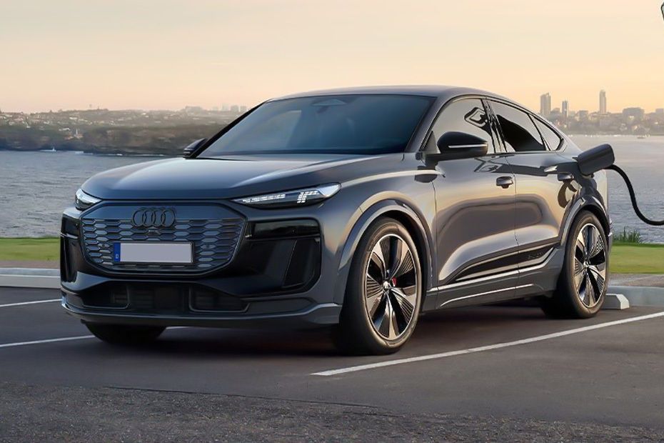 Audi Q6 e-tron electric SUV by the waterfront