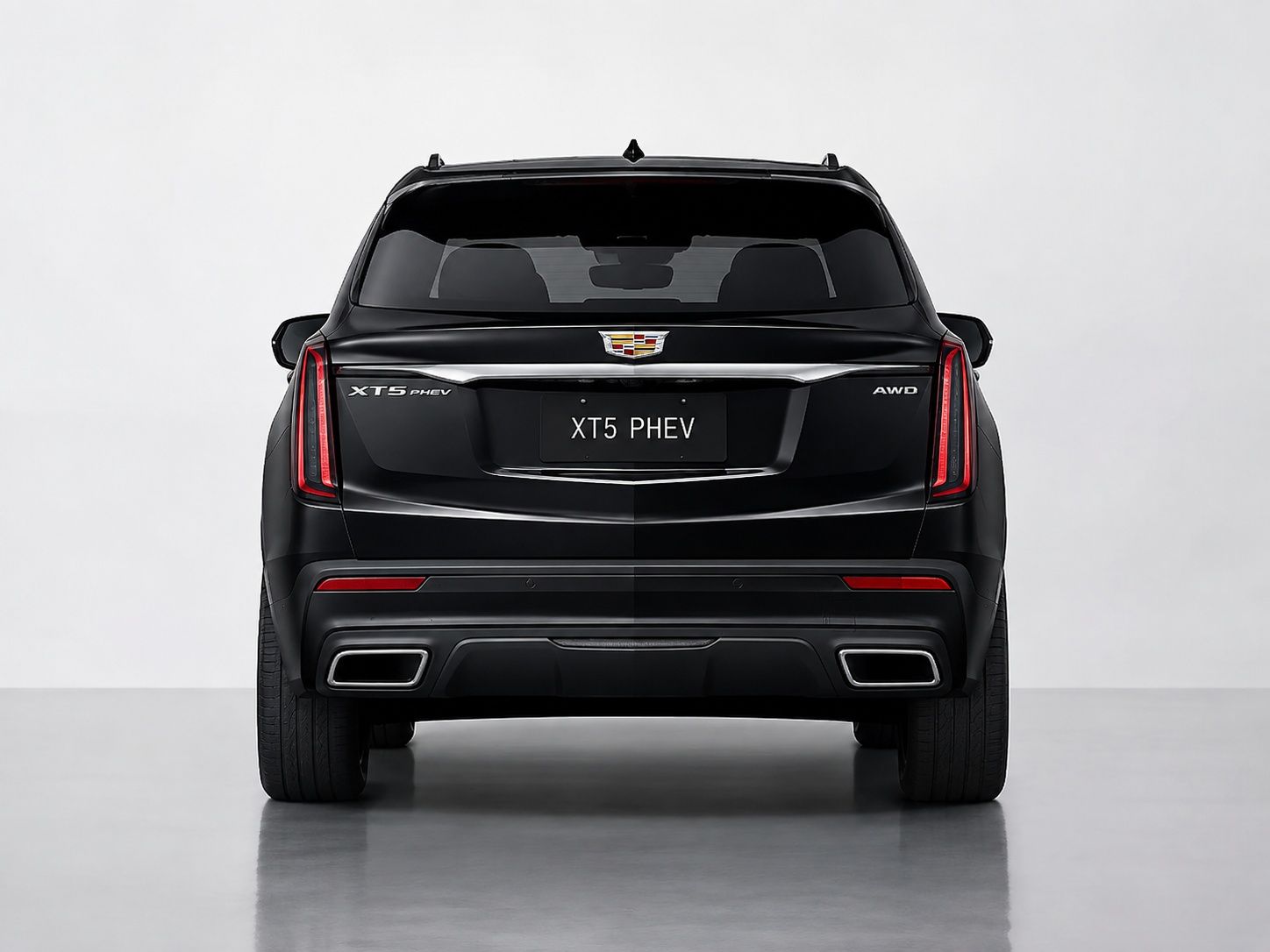 Black Cadillac XT5 PHEV shown from the rear in a studio setting.
