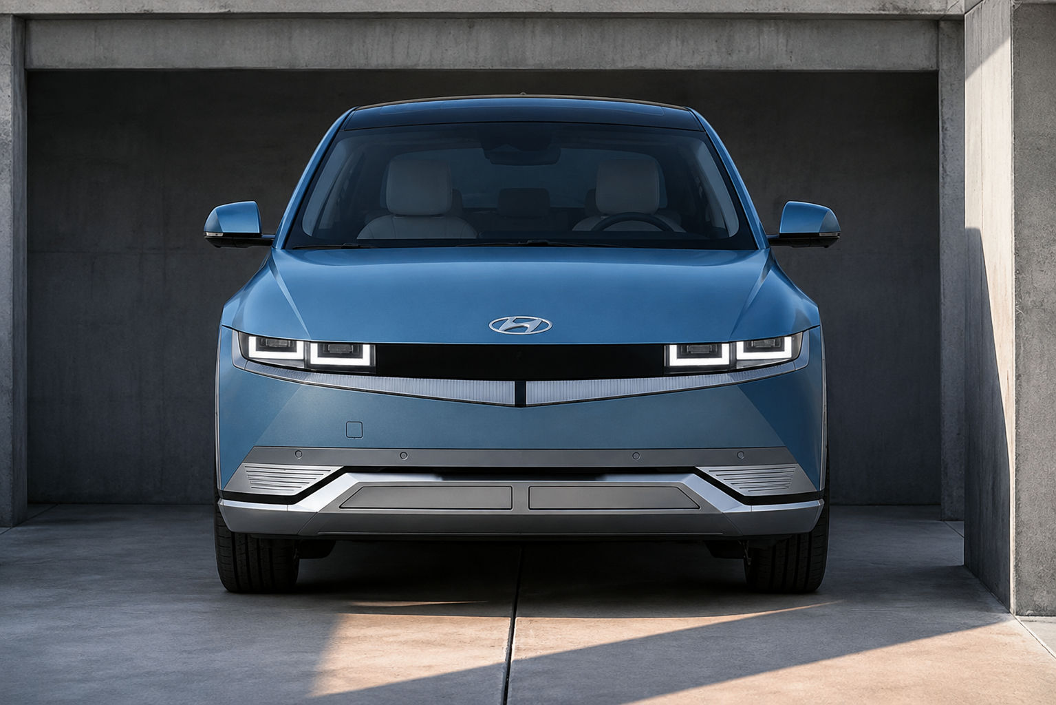 Hyundai IONIQ 5 in Lucid Blue shown from the front three-quarter view