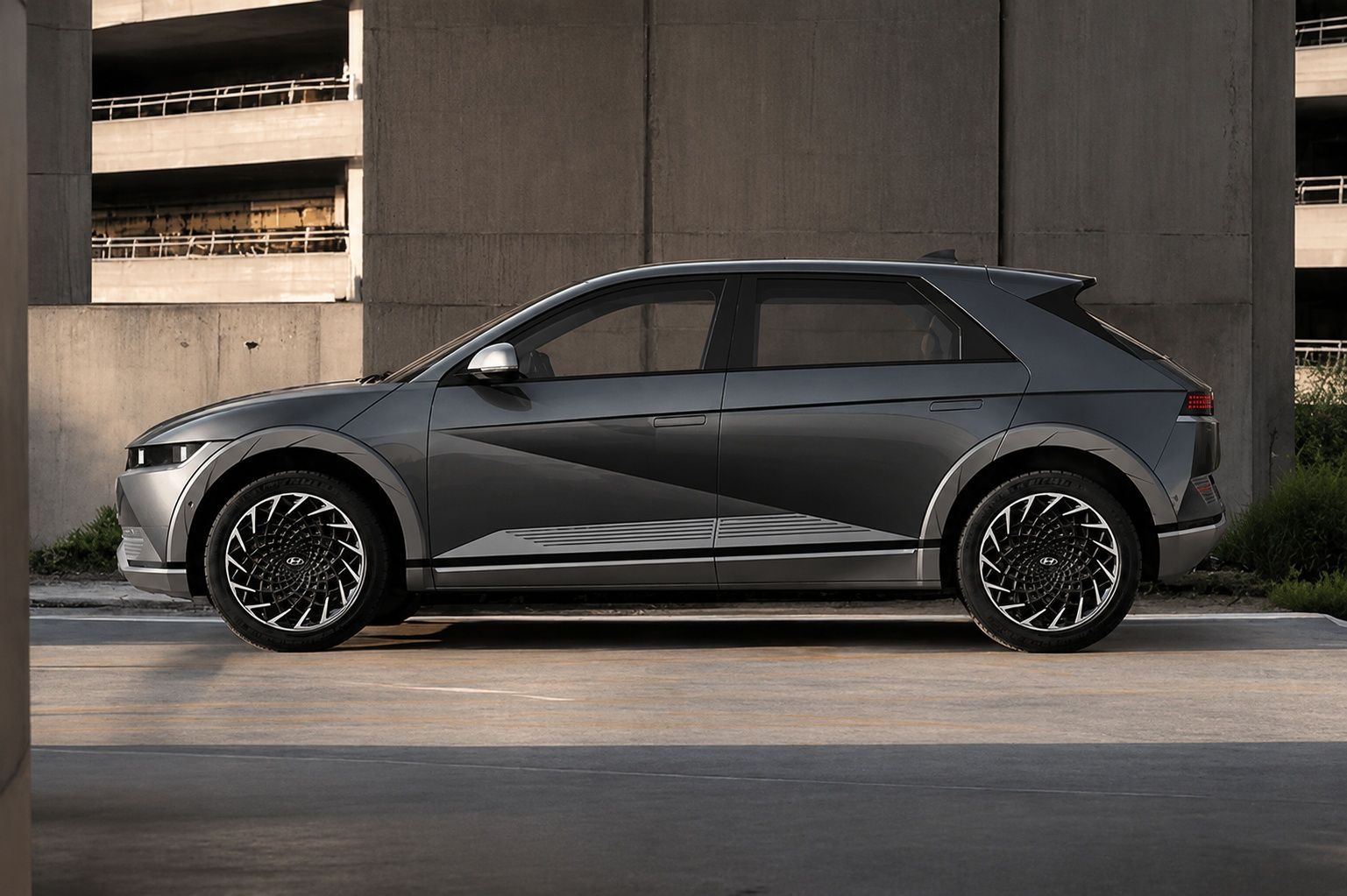 Hyundai IONIQ 5 in Galactic Gray shown in a side profile view.