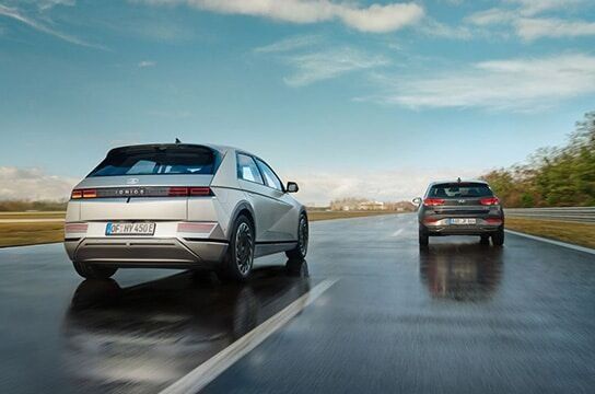 Hyundai IONIQ 5 using Highway Driving Assist on a wet highway