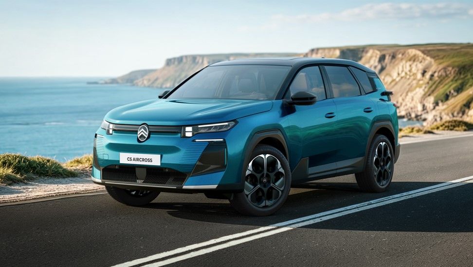 Blue Citroën C5 Aircross driving along a scenic coastal road
