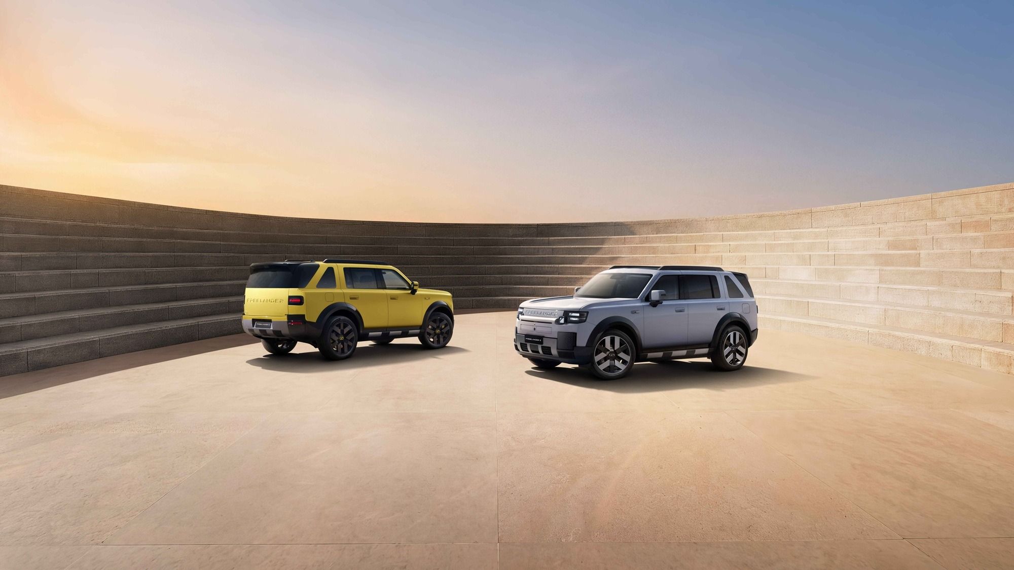 Two Freelander SUVs displayed in UAE Desert