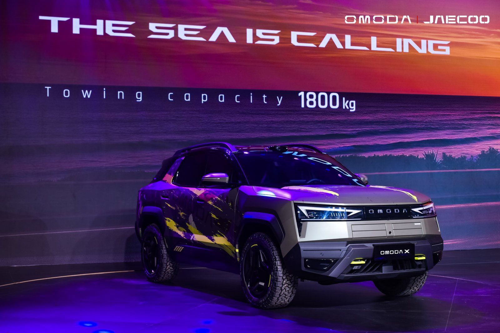OMODA X crossover concept displayed at an OMODA & JAECOO event, showcasing its futuristic design.